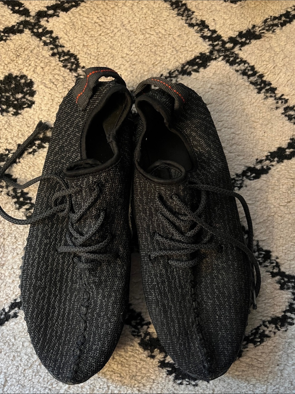 Yeezy Black Knit Lace-Up Sneakers with Subtle Orange Stitching
